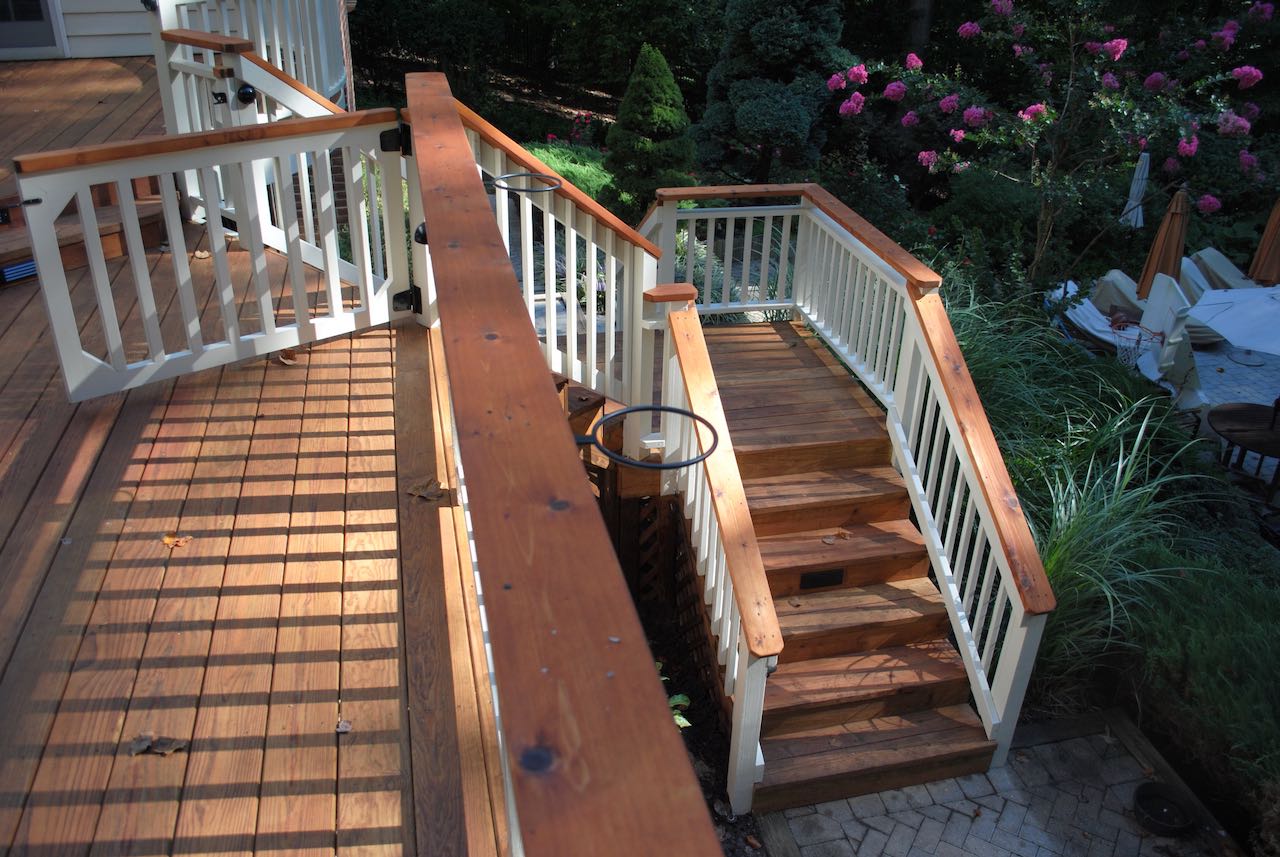 2 story deck with stairs and railing wrap around